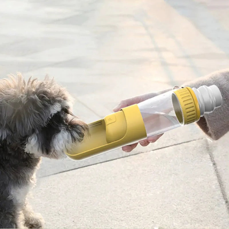 Portable dog water bottle with built-in bowl in dark blue, white, or yellow