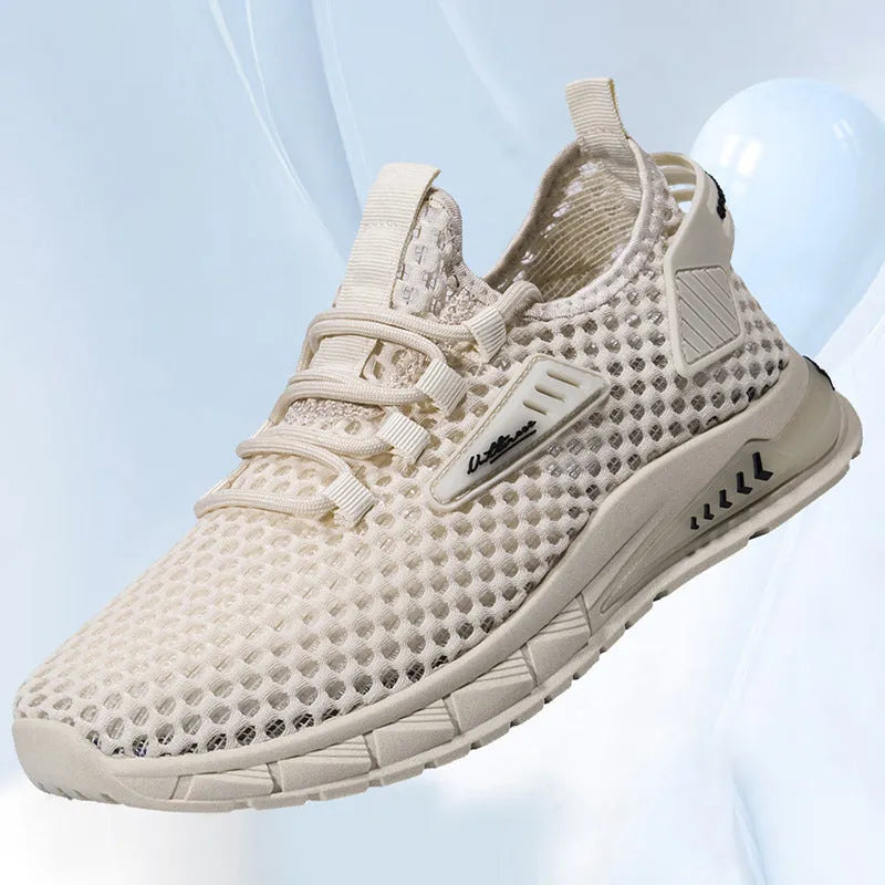 Men's beige casual sneaker with synthetic leather upper and mesh lining, shown with lace-up front.