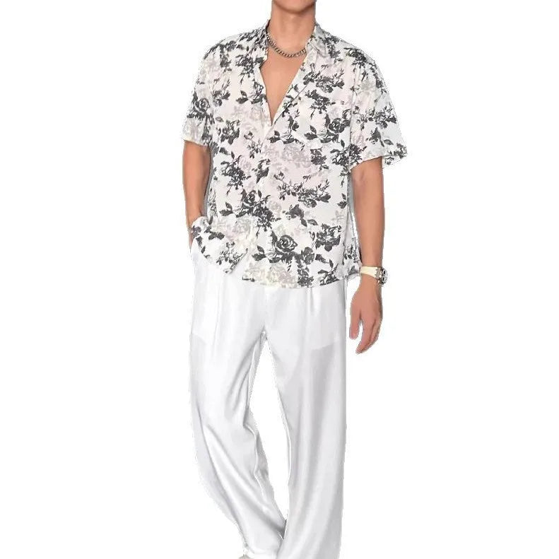 Men's black floral print short sleeve casual shirt with a loose fit and V-neck.