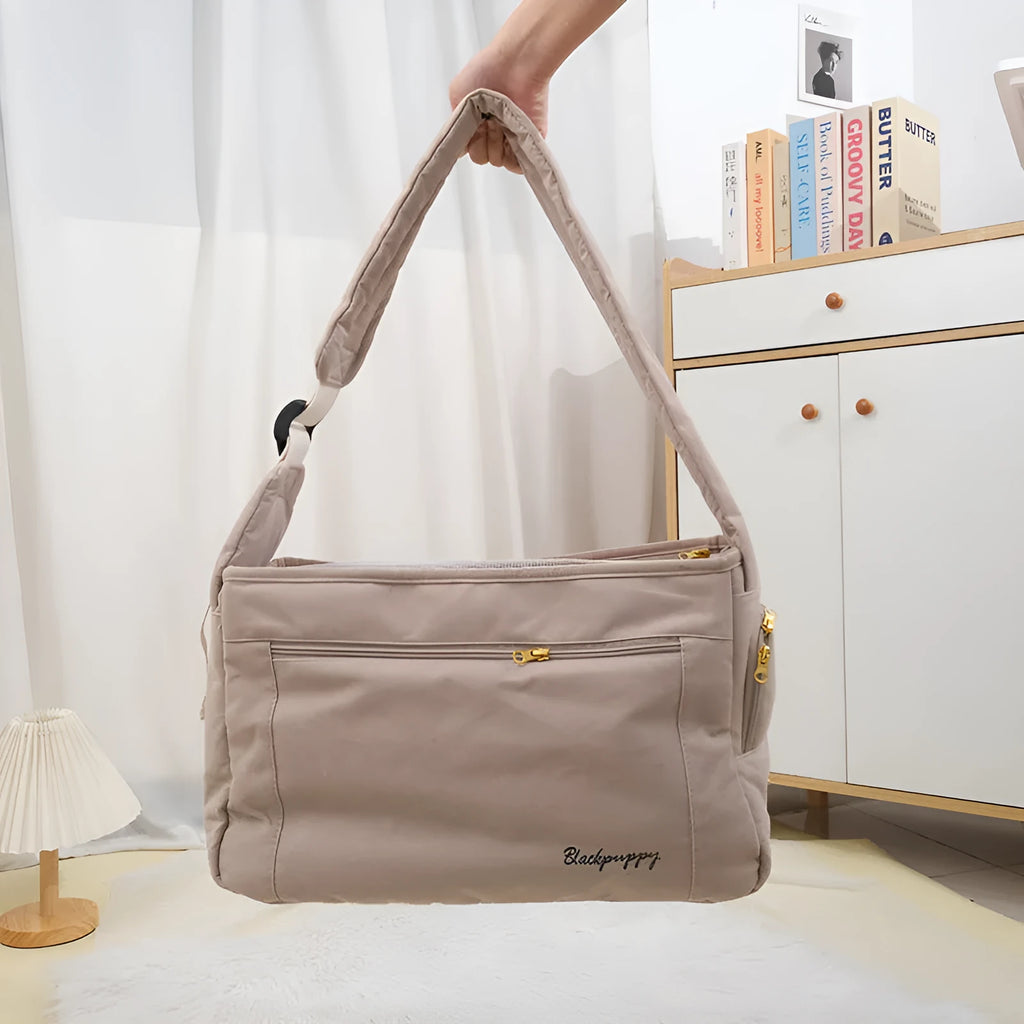 Large capacity soft surface messenger pet carrier bag in beige with small dog inside