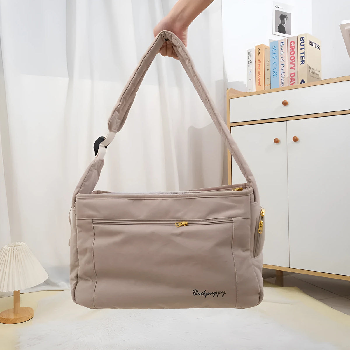 Large capacity soft surface messenger pet carrier bag in beige with small dog inside