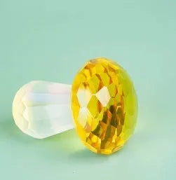 Small crystal mushroom decoration in modern geometric design, 40mm by 53mm.