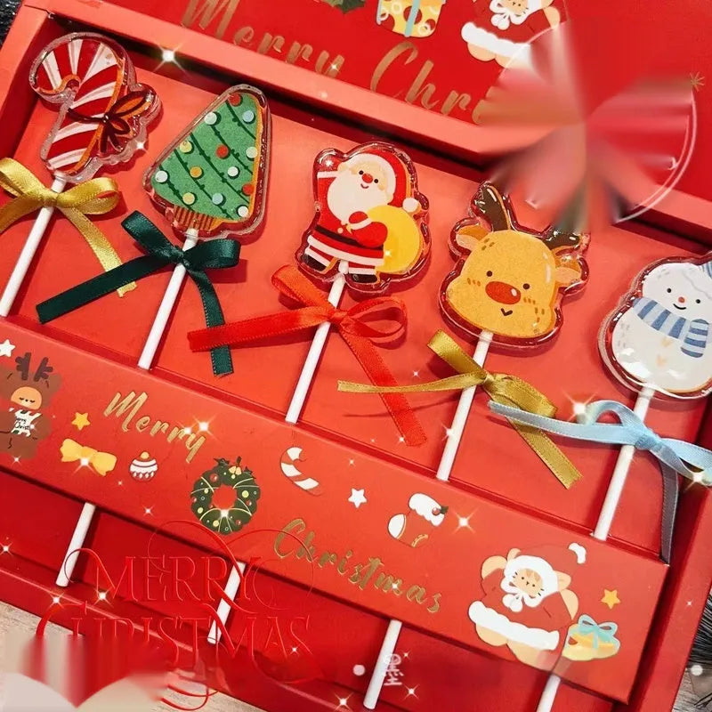 Pack of 5 Santa Claus shaped candies, 100g total net content, on a festive background