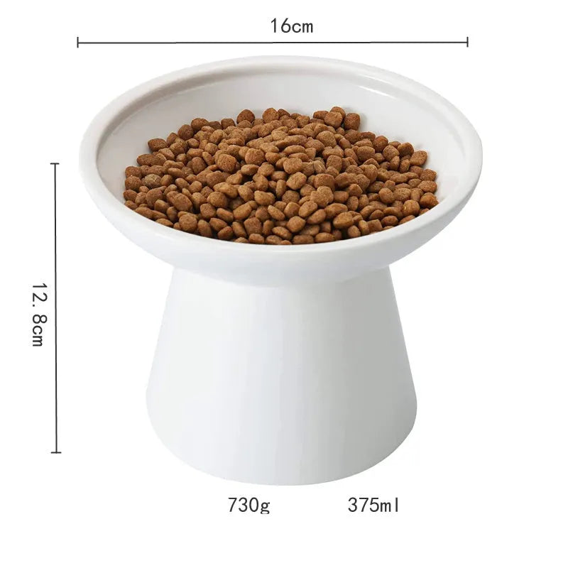 Blue ceramic elevated cat food bowl with wide shallow dish for whisker fatigue prevention.