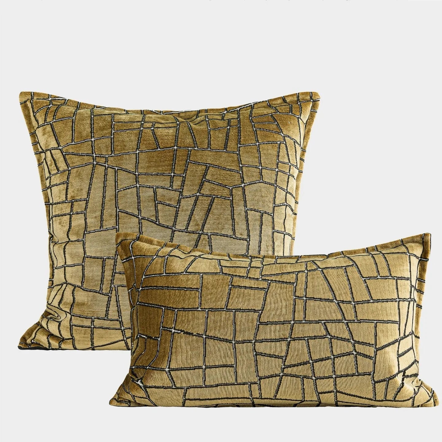 Geometric abstract patterned cushion in local tyrant gold colour, shown in square and lumbar pillow sizes.