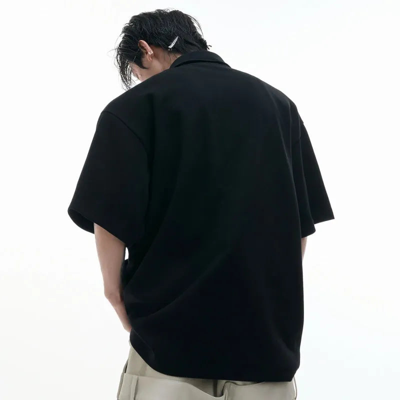 Men's loose fit polo shirt with deconstructed multi-collar design and geometric patterned V-neck