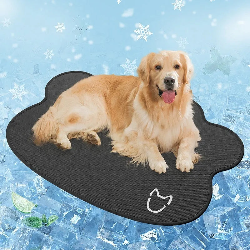 Dog head-shaped Ice Silk pet cooling mat on a hardwood floor, showing non-slip base and light gray colour.