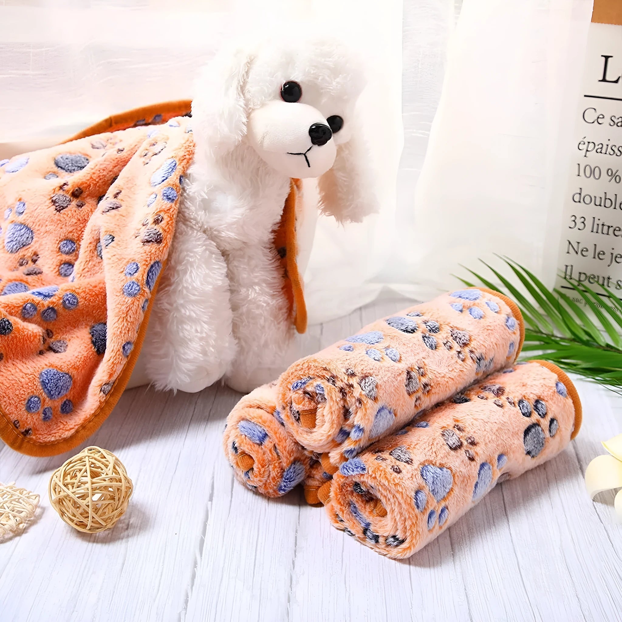 Coral fleece pet blanket with dog paw pattern in various sizes and colours