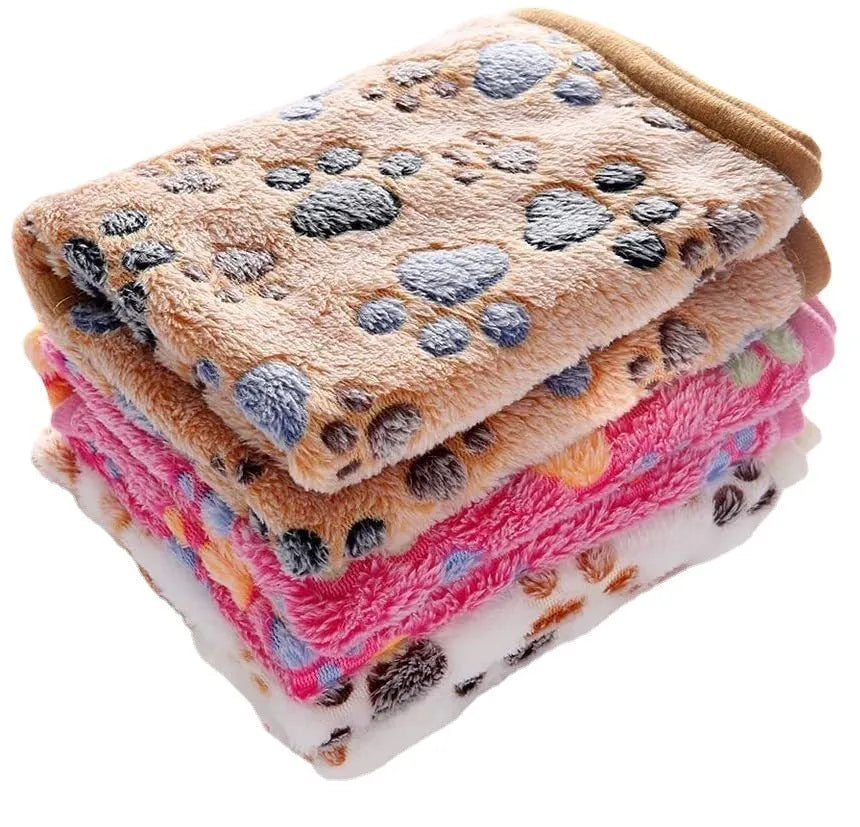 Coral fleece pet blanket with dog paw pattern in various sizes and colours