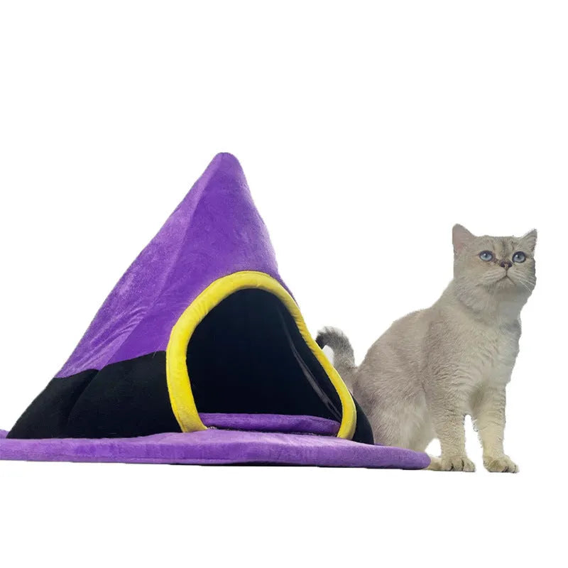 Purple witch hat shaped cat bed measuring 60x45cm with cloth construction