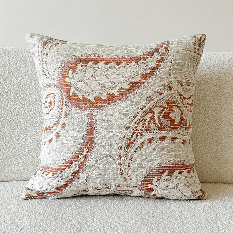 American-style jacquard paisley cushion cover in amber colour showing plant and flower pattern