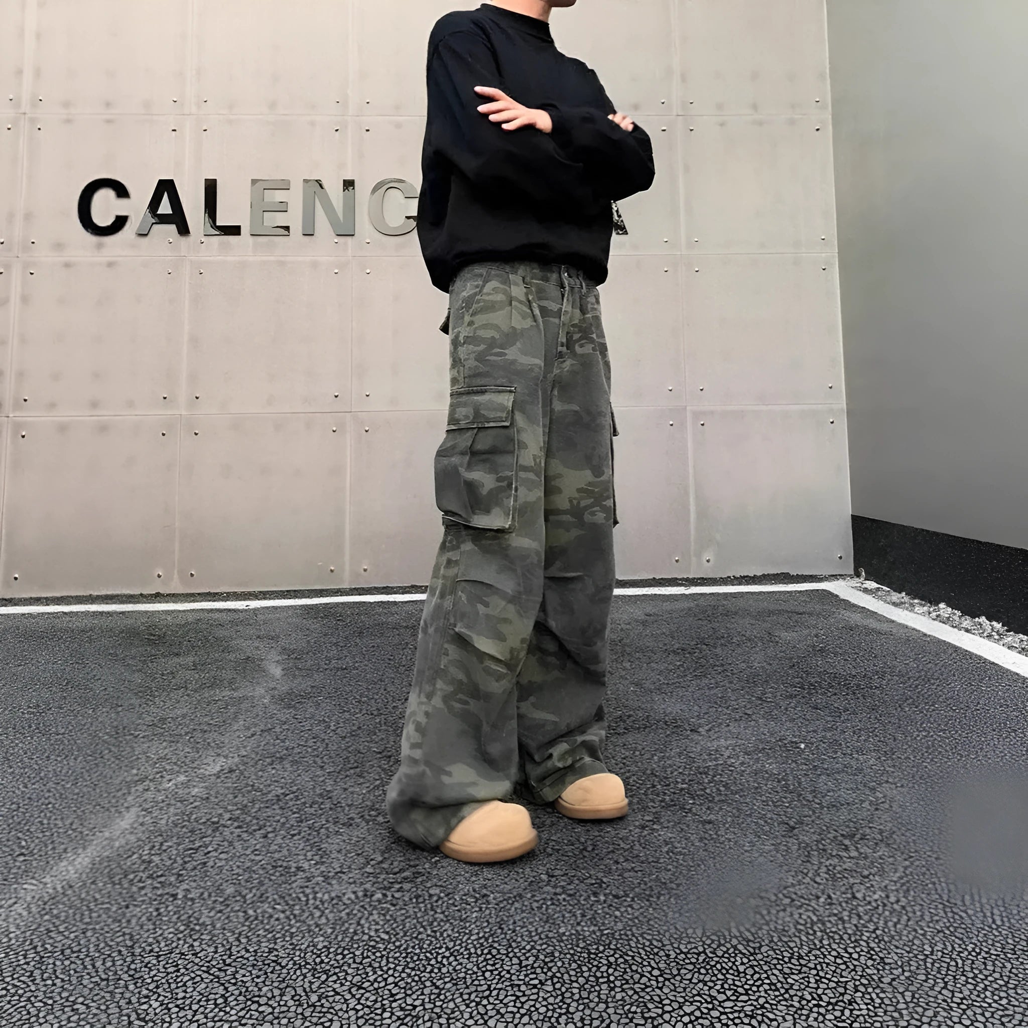 American vintage washed camouflage cotton blend cargo trousers with multiple pockets on a mid-rise waist.