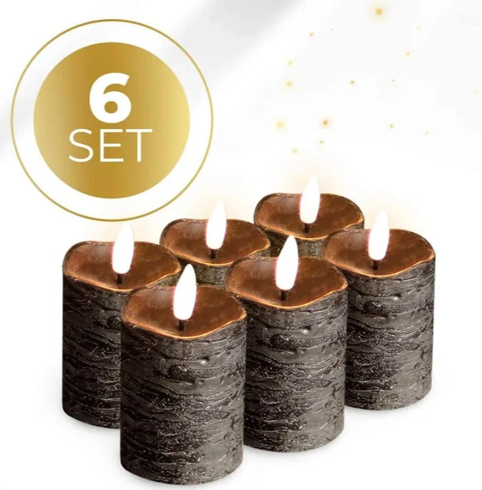 Four black cylindrical LED pillar candles with a soft glowing flame effect on a dark surface.