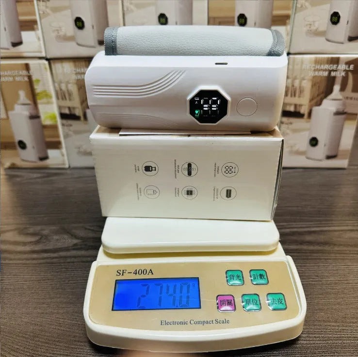 Grey and white car charger milk warmer for infant bottles with 12V power connection