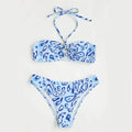 Women's blue floral bandeau bikini with split swimsuit design showing front and back views