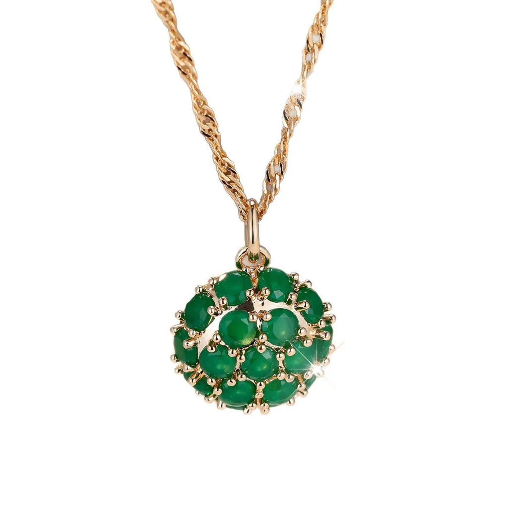 Golden green jade diamond women's necklace with round emerald pendant on an adjustable chain.