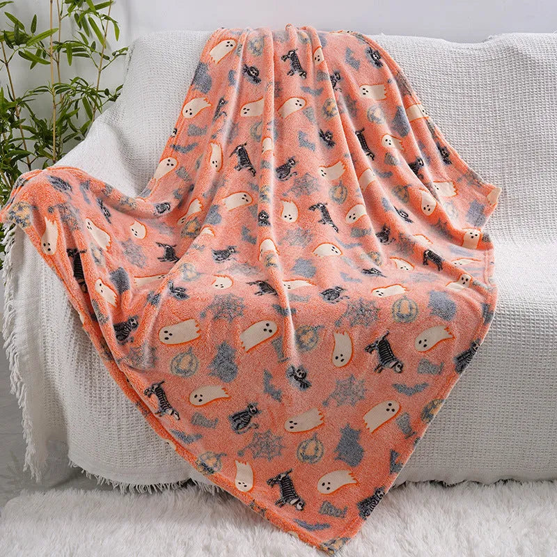 Cartoon-pattern flannel blanket laid flat, showing one of five colour options, suitable as a child's blanket or AC cover.