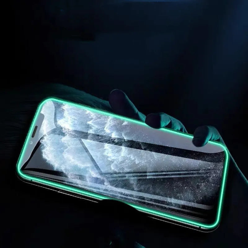 Luminous tempered glass screen protector for iPhone showing glow feature in dark setting