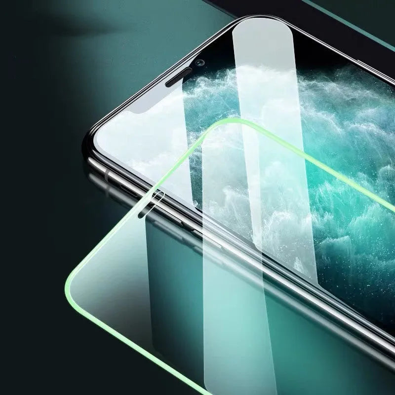 Luminous tempered glass screen protector for iPhone showing glow feature in dark setting