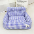 Car-mounted dog travel nest in stain-resistant cloth showing grey and blue plaid colour options