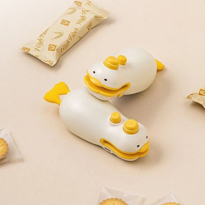 Small yellow duck rechargeable sealing machine with animal jacquard design and charging cable
