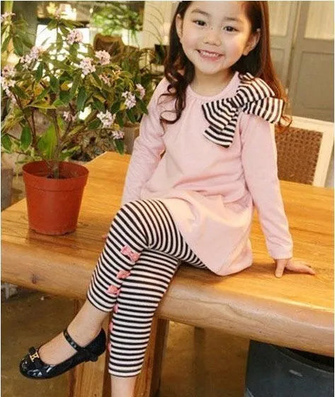 Pink cotton girl clothing set showing coordinated top and bottom in children's sizes 110cm to 140cm