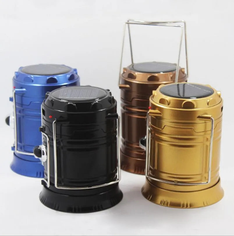 LED solar camping lantern collapsible with reflective lenses and rubber handle, 9x13x7.5cm, water resistant ABS construction