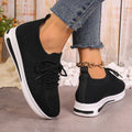 Women's low-top casual sneakers in red, black, or blue with round toe and lace-up front.