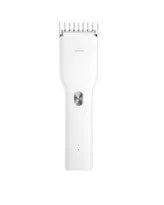 Black and white cordless Boost hair clipper with adjustable slider comb and nano ceramic cutter head.