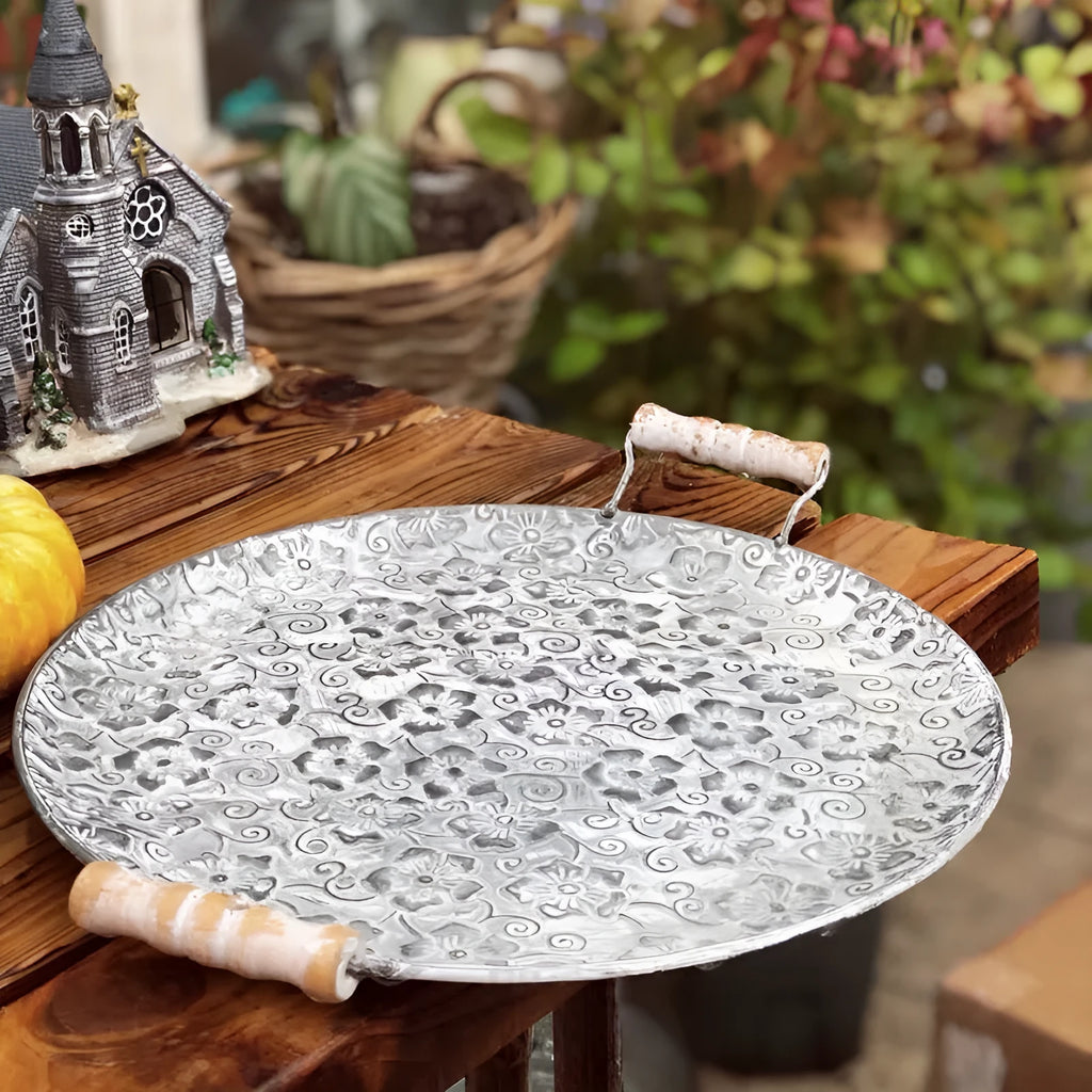 Round wrought iron storage tray in European style, shown in two available sizes for home organisation.
