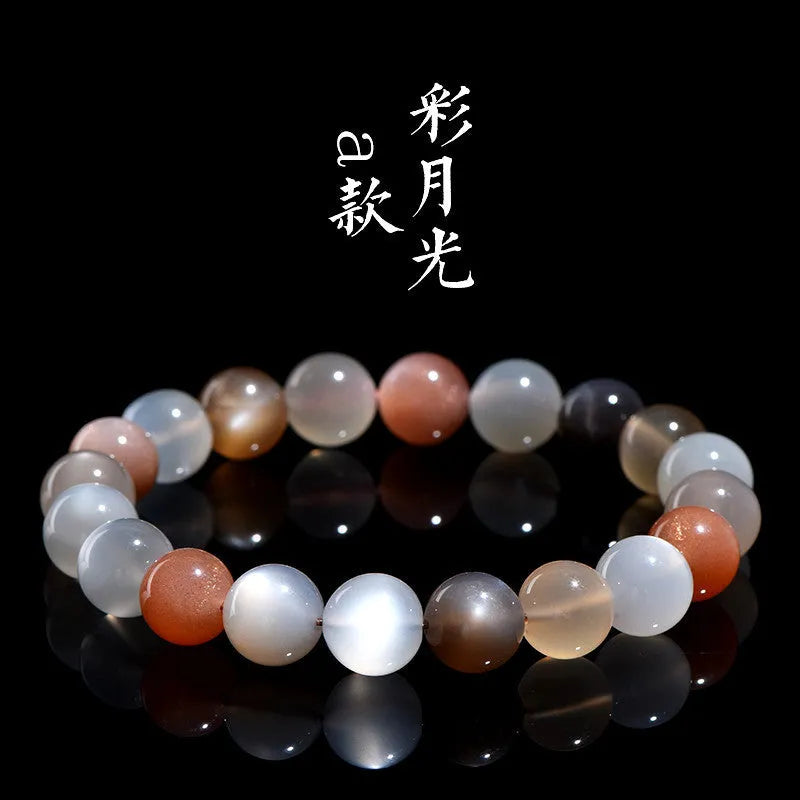Natural moonstone bracelet with colourful light variation showing 8mm beads in single circle configuration
