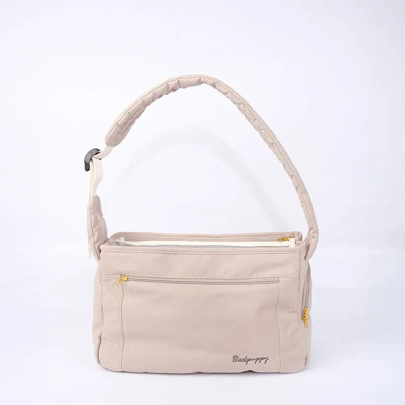 Large capacity soft surface messenger pet carrier bag in beige with small dog inside