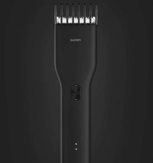 Black and white cordless Boost hair clipper with adjustable slider comb and nano ceramic cutter head.