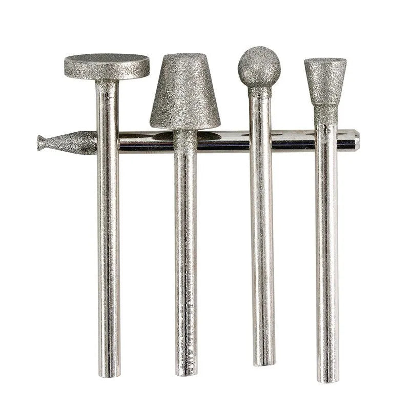 Set of alloy emery grinding heads with elliptical cone shape and 3mm shank.