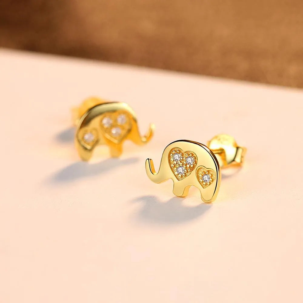 Geometric Korean silver earrings with gem setting detail in gold and silvery colours