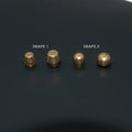 Solid brass decorative buckle for clothing in round and geometric foot nail designs.