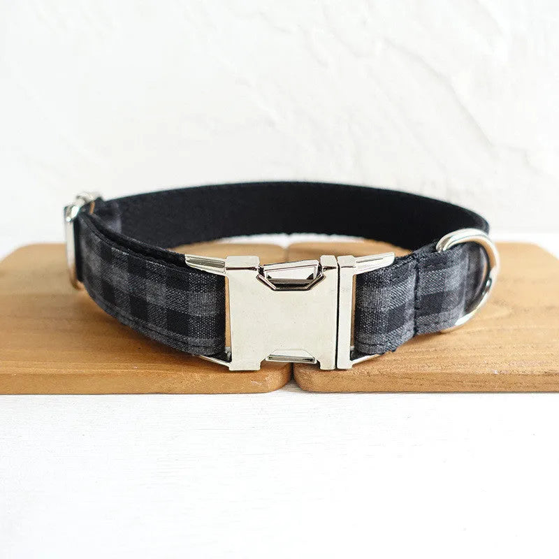 Black polyester dog leash with chain ring and rope strap, available in sizes from XS to XL for training and walking