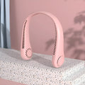Pink bladeless neck fan hanging with USB cable for charging.