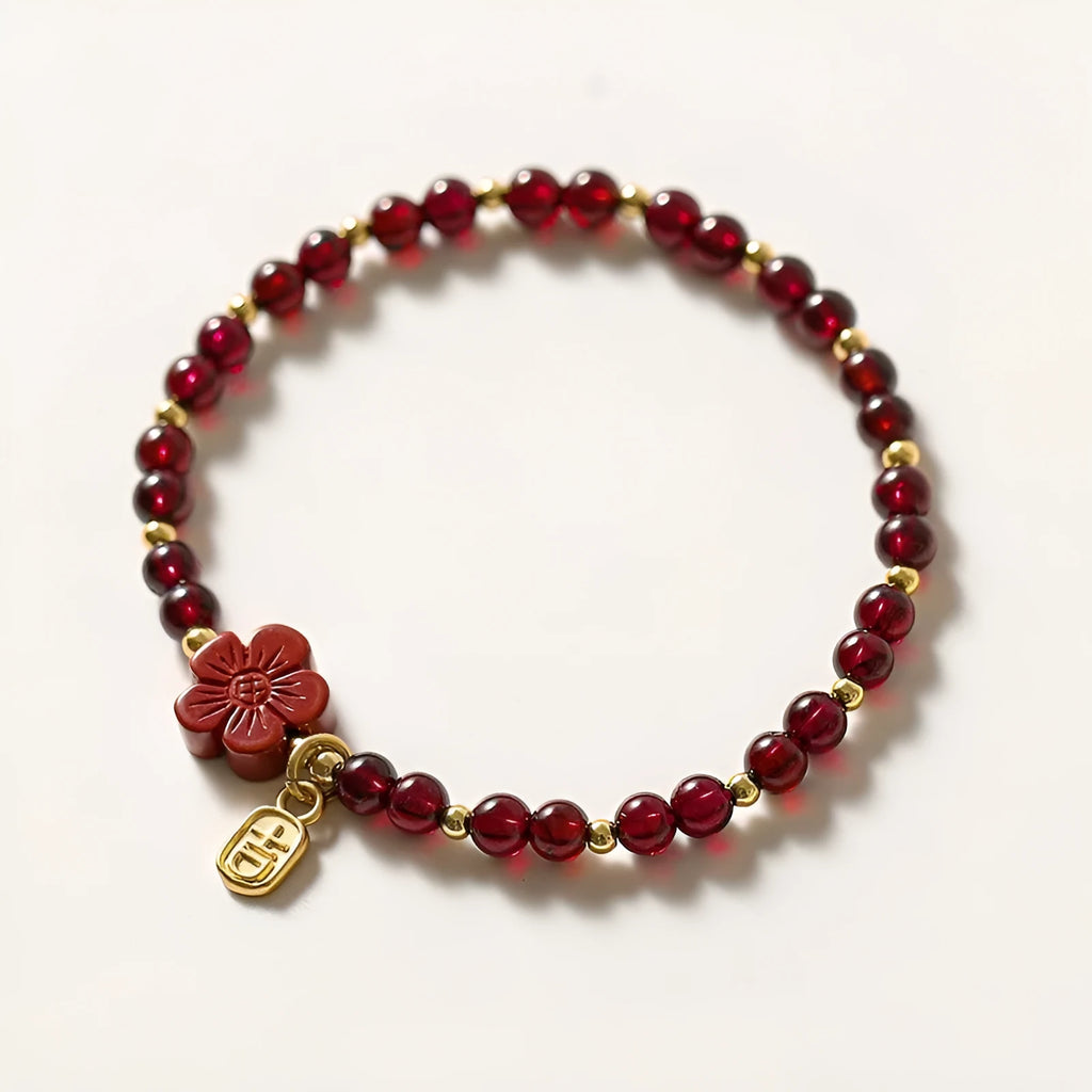 Women's freshwater pearl and crystal bracelet with geometric design on a simple braided or elastic rope band.