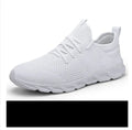 Men's black and white breathable mesh sneakers with lace-up closure and PVC sole.