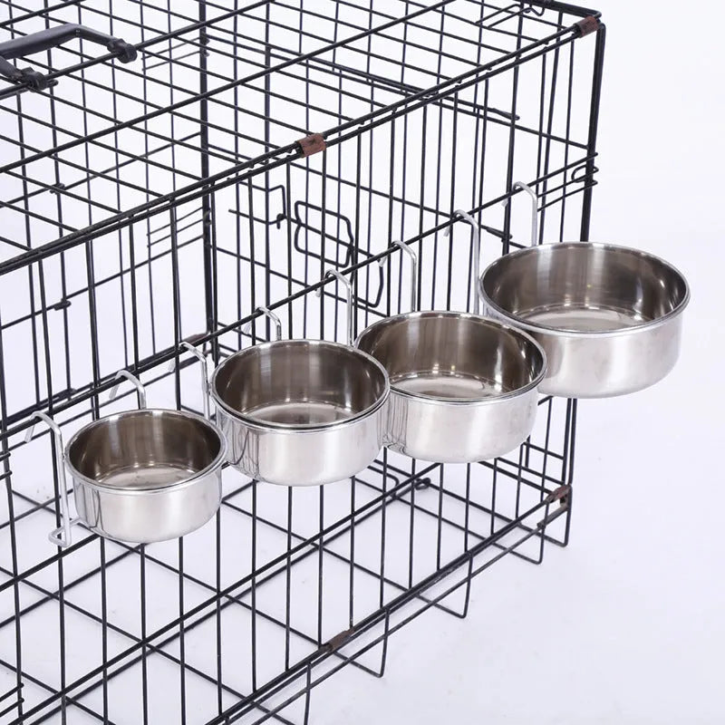 Six stainless steel pet food bowls with frames in sizes from 10cm to 20cm on a neutral background