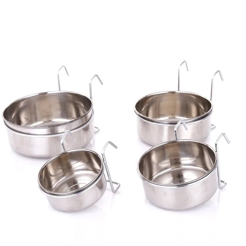 Six stainless steel pet food bowls with frames in sizes from 10cm to 20cm on a neutral background