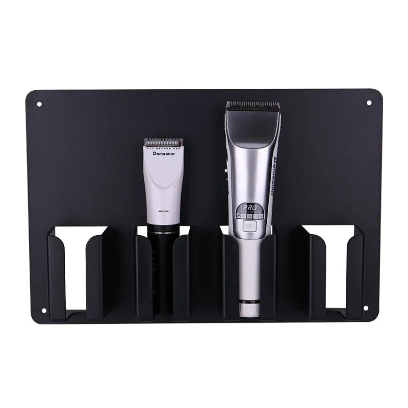 Black plastic wall-mounted storage box holding four electric hair clippers with screws included for installation