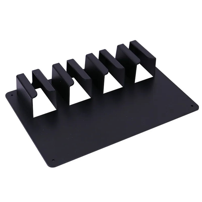 Black plastic wall-mounted storage box holding four electric hair clippers with screws included for installation
