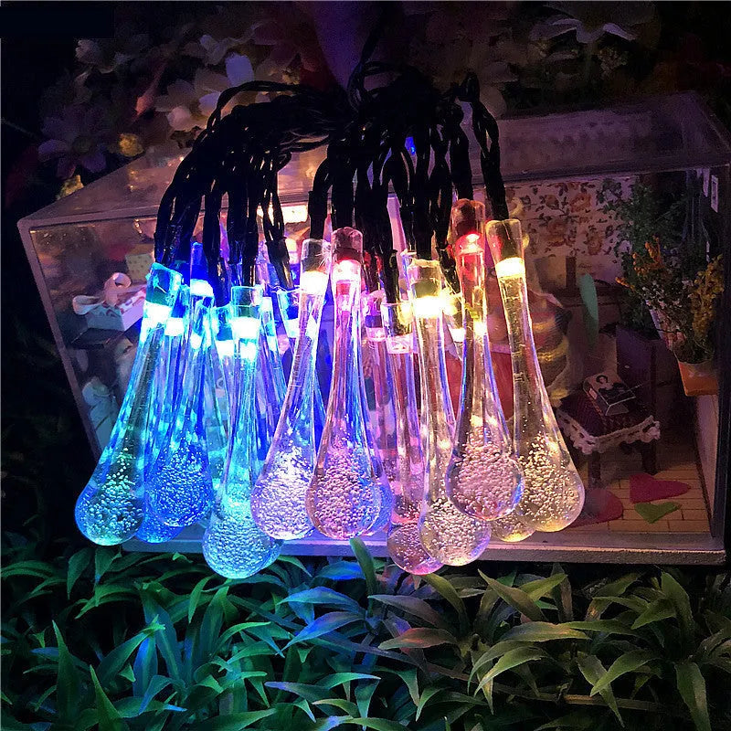 30 LED solar-powered water drop shaped string lights on a 6.5m cable for outdoor garden use.