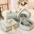 Ceramic jewellery storage box with tissue dispenser in bright colours showing removable ring and earring compartment