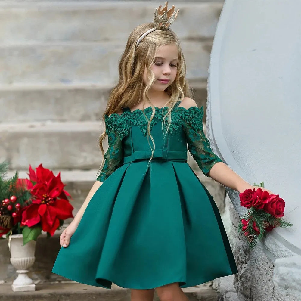 A girls' lace-trimmed dress set comprising a top and skirt, shown in one of the available colours.