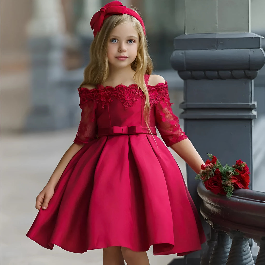 A girls' lace-trimmed dress set comprising a top and skirt, shown in one of the available colours.