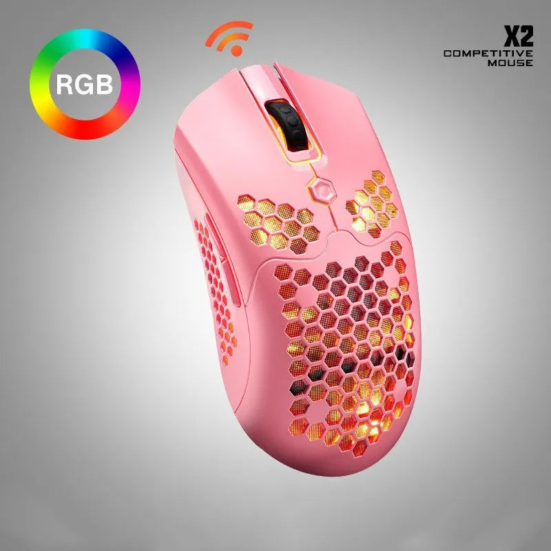 Free Wolf X2 wireless RGB gaming mouse with honeycomb shell in multiple colours on a desk.