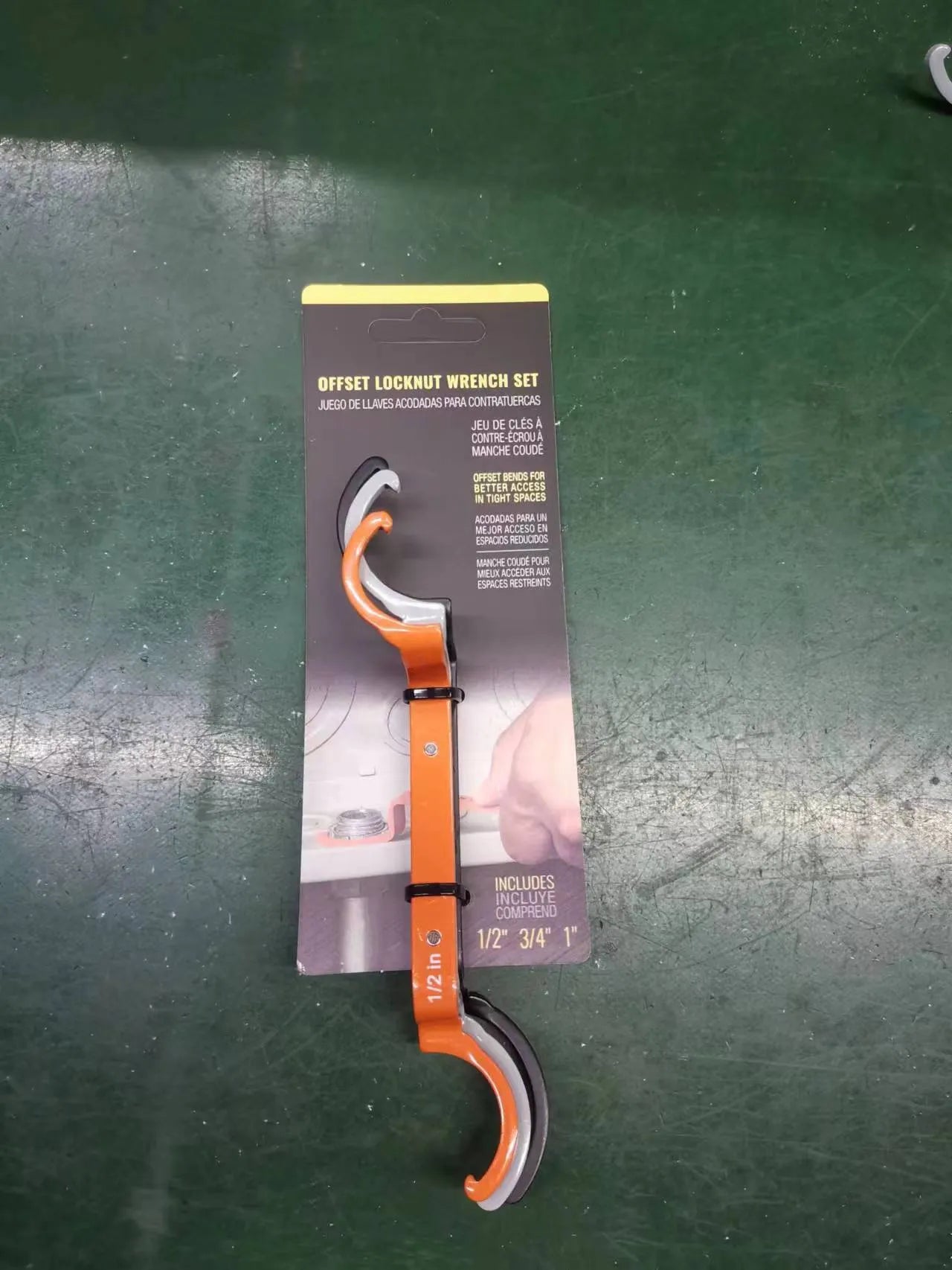 Crescent magnetic suction, locking, and catheter wrenches from the H251 three-piece set in orange, grey, and black.